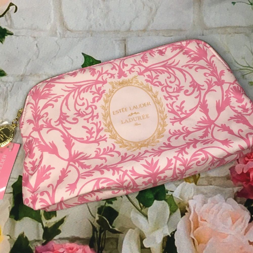 Estee Lauder Pink zipper small cosmetic make up pouch comes with lip stick